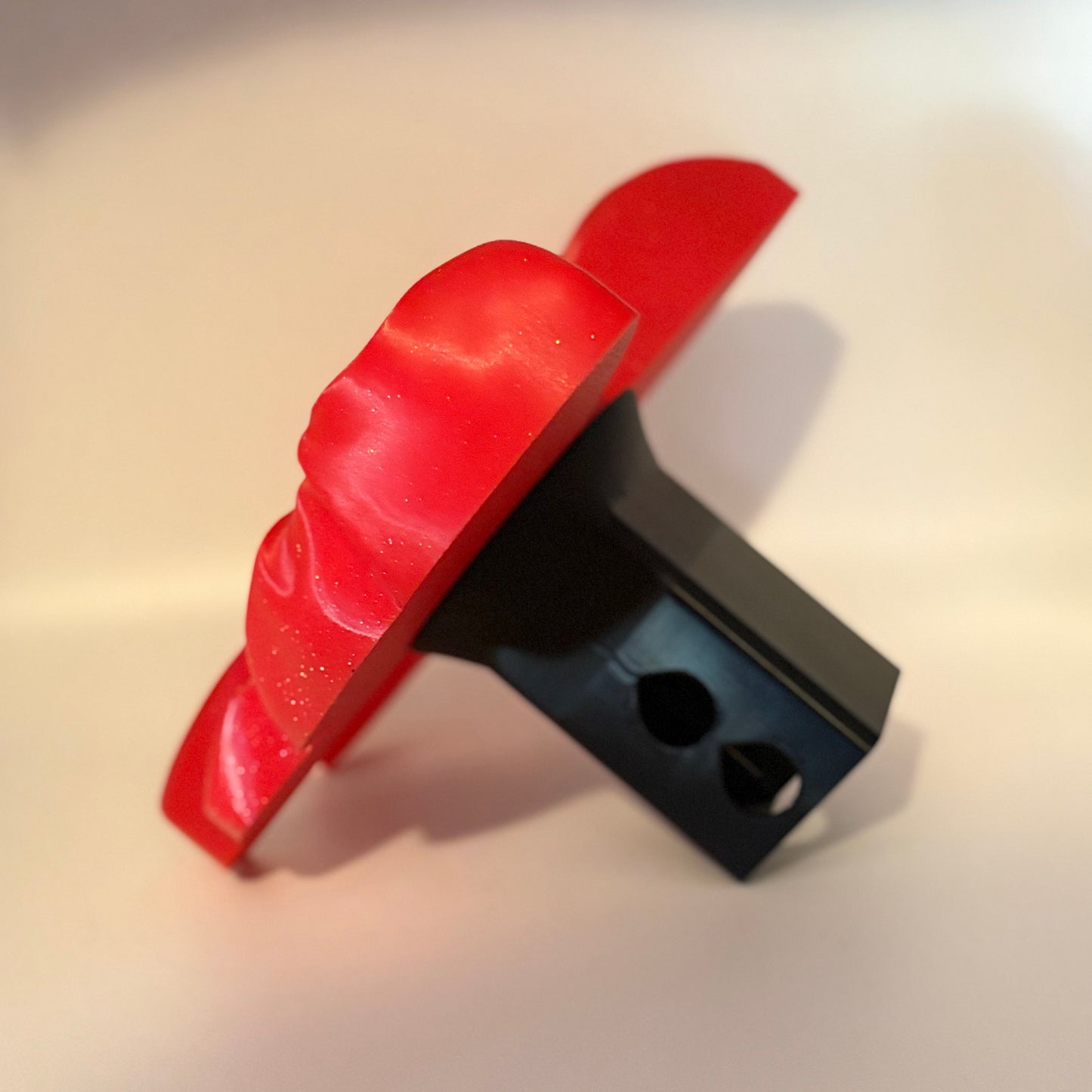 Side view of the red bow tow hitch over with 2 inch receiver